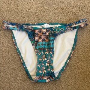 Multi color unique bikini bottoms with double string sides